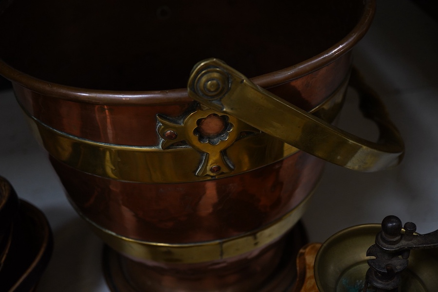 Brass and copper pedestal log-box three Sussex trugs and coffee mill, log box 32cm high